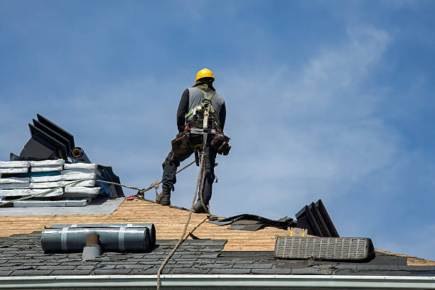 Professional Roofing technician working in Adelanto, CA